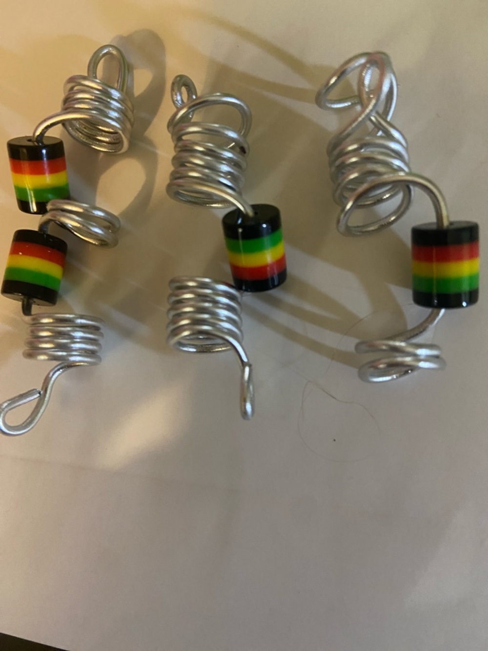 Hand Crafted Silver Spiral Hair Cuffs with Black Red Yellow Green Stripes